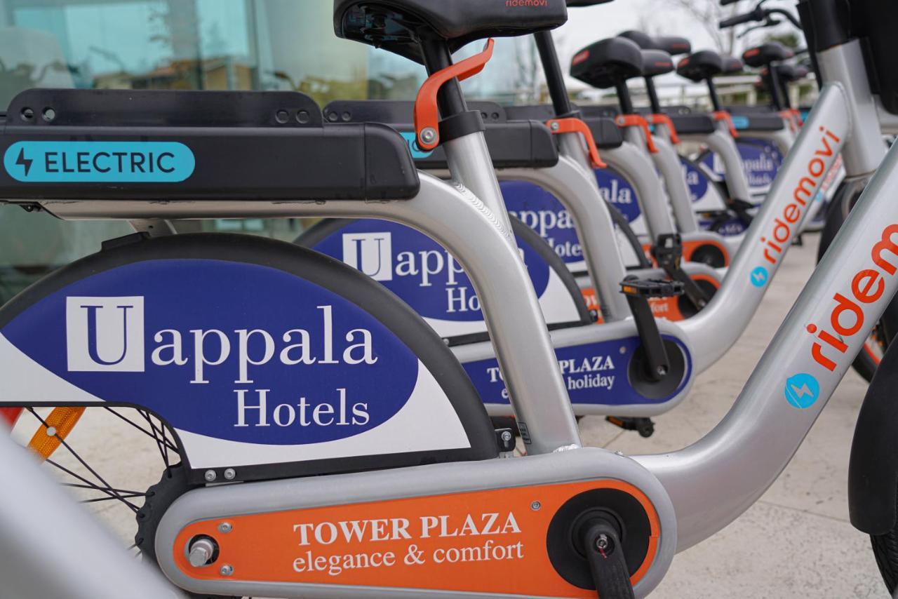 Pisa Tower Plaza Hotel Luaran gambar Electric bicycles at the airport